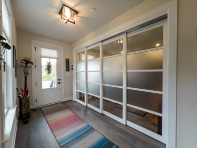 sliding glass doors with frosted glass panes and soft close and open track system in columbia, MD