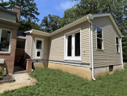 Master En-Suite Home Addition in Howard County, MD with Tan Siding, Gable Roof, French Door, and Entry Door